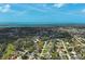 Scenic aerial view of a neighborhood with a water view at 587 Viridian St, Englewood, FL 34223