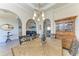 Elegant dining room featuring a unique chandelier and decorative wood cabinet at 8144 Antwerp Cir, Port Charlotte, FL 33981