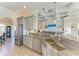 Well-appointed kitchen featuring granite countertops and stainless steel appliances at 8144 Antwerp Cir, Port Charlotte, FL 33981