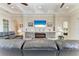 Comfortable living room with a stone fireplace and stylish decor at 8144 Antwerp Cir, Port Charlotte, FL 33981
