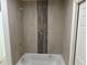 Bathroom featuring a tub with tile surround and wooden decorative accent at 9172 Ravel St, Port Charlotte, FL 33981