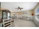 Inviting living space featuring neutral tones, wood-look tile floors, and comfortable seating at 9350 Prospect Ave, Englewood, FL 34224
