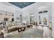Bright and airy living room with a view of the kitchen and entryway at 10082 Army Cir, Port Charlotte, FL 33981