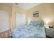 Comfortable bedroom featuring a double closet and a window with bright, natural light at 10183 Winding River Rd, Punta Gorda, FL 33950