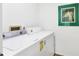 Convenient laundry area featuring a modern washer and dryer at 10299 Willmington Blvd, Englewood, FL 34224