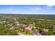 Aerial view of a neighborhood with many trees at 103 Mecca St, Port Charlotte, FL 33954