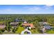 Sprawling home with a circular driveway and lush landscaping at 103 Mecca St, Port Charlotte, FL 33954