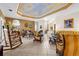 Bright and airy living room with a decorative ceiling, comfortable seating, and seamless flow throughout at 103 Mecca St, Port Charlotte, FL 33954