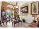 Cozy sitting area with elegant decor, a large window, and warm, inviting colors at 103 Mecca St, Port Charlotte, FL 33954