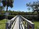 Scenic community dock offering access to the waterway for boating and water activities at 107 Jose Gaspar Dr, Englewood, FL 34223