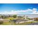 Home's aerial view showcasing proximity to the water and surrounding neighborhood at 12605 Bacchus Rd, Port Charlotte, FL 33981