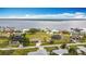 A waterfront neighborhood offers stunning views and boat access to the river at 12605 Bacchus Rd, Port Charlotte, FL 33981