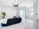 Bright and spacious living room with tile floors and an open floor plan at 12605 Bacchus Rd, Port Charlotte, FL 33981