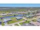 Beautiful waterfront homes with canal access, lush greenery surrounds property at 13 Caddy Rd, Rotonda West, FL 33947