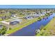 Beautiful community with lovely waterfront homes and a serene canal at 13 Caddy Rd, Rotonda West, FL 33947