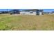 Spacious backyard with ample opportunity to landscape and create an outdoor oasis at 13 Caddy Rd, Rotonda West, FL 33947