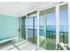 Balcony with sliding glass doors offering stunning ocean views, creating a serene and relaxing atmosphere at 1401 Beach Rd # 304, Englewood, FL 34223