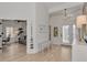 Inviting foyer with bright front door, bench, and seamless access to the living spaces at 14236 Silver Lakes Cir, Port Charlotte, FL 33953