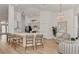 Bright kitchen features a marble countertop island with seating and modern appliances, perfect for entertaining at 14236 Silver Lakes Cir, Port Charlotte, FL 33953