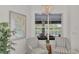 Sitting area with patterned chairs and a map with water view at 14236 Silver Lakes Cir, Port Charlotte, FL 33953
