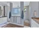 Luxurious main bathroom featuring dual vanities and a beautifully designed shower at 14246 Maysville, Port Charlotte, FL 33981