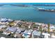 Waterfront homes with docks and boat lifts along the canal offer easy access to boating and water activities at 1432 Lemon Bay Dr, Englewood, FL 34223