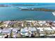 This aerial view highlights the location of the waterfront property on the canal at 1432 Lemon Bay Dr, Englewood, FL 34223