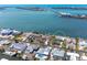 This aerial view highlights the location of the waterfront property on the canal at 1432 Lemon Bay Dr, Englewood, FL 34223