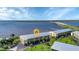 Waterfront condos featuring boat docks, lush lawns, and nearby bridge access at 14459 River Beach Dr # 129, Port Charlotte, FL 33953