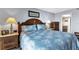 Bedroom featuring a stylish coastal theme with white and blue bedding and decorative touches at 14459 River Beach Dr # 129, Port Charlotte, FL 33953