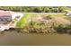 Waterfront lot on canal with seawall, perfect for boaters and water enthusiasts at 15342 Aron, Port Charlotte, FL 33981
