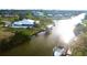 Waterfront home with boat dock and canal access, providing stunning aerial views at 15342 Aron, Port Charlotte, FL 33981