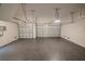 Spacious garage featuring epoxy flooring and ample room for multiple vehicles and storage at 15342 Aron, Port Charlotte, FL 33981