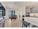 Bright dining area with views and direct access to the outdoors for seamless entertaining at 15498 Seafoam Cir, Port Charlotte, FL 33981