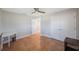 This cozy bedroom includes tile floors, closet space, and an entrance to the hallway at 1694 Harbor W Cir, Largo, FL 33770