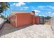 Exterior view of the home showing brick pavers, siding, and screened in pool area at 1694 Harbor W Cir, Largo, FL 33770