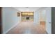 Open living room with a stone fireplace at 1694 Harbor W Cir, Largo, FL 33770