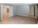 Neutral living room with tile floors and white trim at 1694 Harbor W Cir, Largo, FL 33770