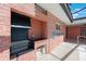 Brick outdoor kitchen with grill and countertop at 1694 Harbor W Cir, Largo, FL 33770
