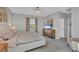 Bedroom featuring large bed, dresser with a TV, and window views at 1824 Saddlewood Cir, Port Charlotte, FL 33953