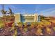Community sign for Biscayne Landing with lush landscaping and vibrant colors at 1824 Saddlewood Cir, Port Charlotte, FL 33953