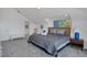 Comfortable bedroom with a cozy bed, neutral decor, and a view of the outside at 19 Grouper Hole Dr, Boca Grande, FL 33921