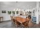 Elegant dining room with hardwood floors and a view of the kitchen at 19 Grouper Hole Dr, Boca Grande, FL 33921