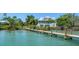Dock with access to the water provides ample mooring and recreational opportunities at 19 Grouper Hole Dr, Boca Grande, FL 33921