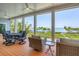 Inviting outdoor patio with comfortable seating and stunning waterfront views at 19 Grouper Hole Dr, Boca Grande, FL 33921
