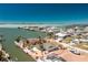 Waterfront home with boat dock and direct access to bay waters, offers a perfect blend of coastal living at 1957 Arkansas Ave, Englewood, FL 34224