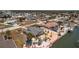 Waterfront home with private dock on a canal, set amid tropical landscaping with serene views at 1957 Arkansas Ave, Englewood, FL 34224