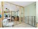 Bathroom features unfinished construction, toilet and exterior access at 1957 Arkansas Ave, Englewood, FL 34224