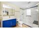 Bathroom with updated shower, vanity, and fixtures at 1957 Arkansas Ave, Englewood, FL 34224