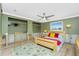 Bedroom with ceiling fan and an area for closets at 1957 Arkansas Ave, Englewood, FL 34224
